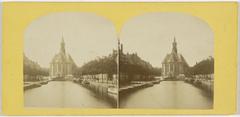View of the Nieuwe Kerk church exterior in Den Haag from the Wijnhaven canal with historic buildings alongside the water