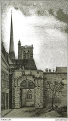 Historic Porte de la Madeleine gate in Troyes, France at dusk with illuminated stone architecture