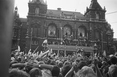 Ajax football players on balcony cheered by huge crowd in Amsterdam 1971
