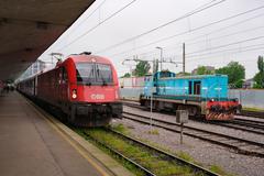 ÖBB 1216 144 locomotive at Ljubljana train station with Slovenian shunting locomotive 642-190