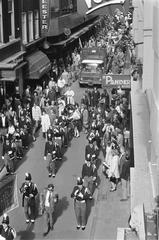 Stone statue group of David, Goliath and shield bearer being transported on a truck from Waaggebouw to the Historical Museum in Kalverstraat Amsterdam in 1969