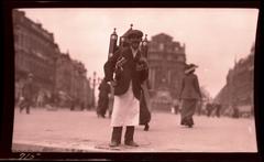 Street vendor selling Belgian beer in Brussels with beer pack and mugs on shoulder straps, 1913