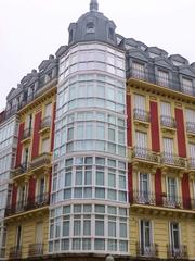 Alameda de Mazarredo street view in Bilbao with modern buildings and trees