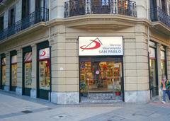 Librería San Pablo bookstore in Bilbao with its colorful facade and books displayed