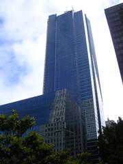 Millennium Tower at 301 Mission Street with surrounding midrise buildings under foggy sky