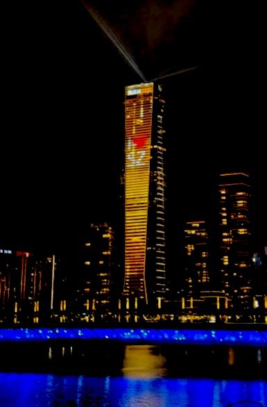 Hanking Center building in Shenzhen, China at sunset