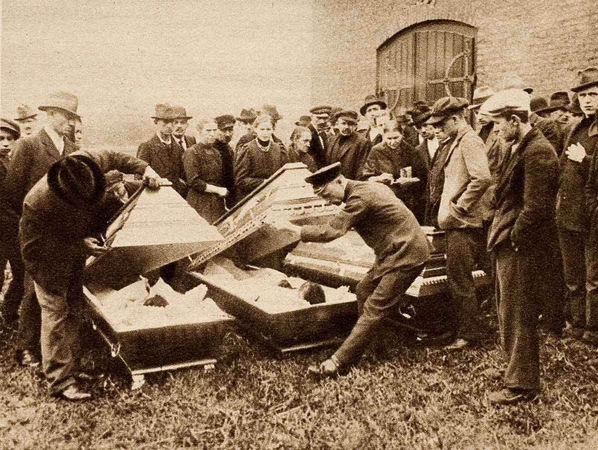 1921 mining disaster at Mont Cenis mine in Herne, Germany with families mourning miners