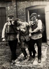 Rescued boy wearing oxygen mask from Mont Cenis mine disaster 1921