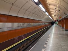 Křižíkova Prague metro station platform with trains and passengers