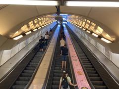 Křižíkova metro station interior with train and passengers