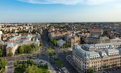University Square in Bucharest with historical buildings and vibrant city life