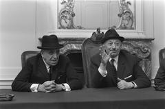 British parliamentarian Barnett Janner and Jewish human rights activist Simon Wiesenthal at a solidarity rally in the Portuguese-Israelite synagogue in Amsterdam