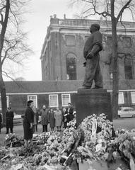 Golda Meir laying a wreath at De Dokwerker monument in Amsterdam