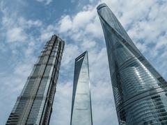 Skyline of Shanghai featuring Jin Mao Tower, Shanghai World Financial Center, and Shanghai Tower