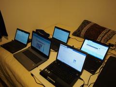 Several laptops used for uploading data at the National Archive