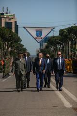 Albanian President Ilir Meta walking down center lane of military formation at Immediate Response 21 ceremony