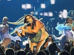 Lizzo performing on stage at Madison Square Garden in 2022