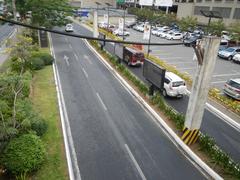 North Avenue interchange with EDSA in Quezon City with visible road signs and SM West building
