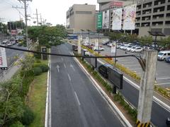 North Avenue Quezon City interchange with EDSA featuring SM West shopping mall and surrounding urban area
