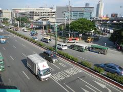 North Avenue interchange with EDSA in Quezon City with heavy traffic and city buildings