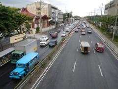 North Avenue and EDSA interchange with traffic and high-rise buildings in Quezon City