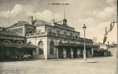 Vintage postcard of Rennes train station with historic architecture