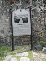 Baluarte de San Diego historical fort and garden in Intramuros Manila with curved fortress walls and cannons