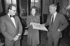 Queen Beatrix receiving commemorative stamps at Paleis Lange Voorhout