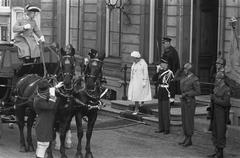 Queen and Prince Bernhard leaving the palace after Princess Wilhelmina's burial in 1962