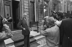 De Gaay Fortman CDA politician leaving Paleis Lange Voorhout in The Hague surrounded by press photographers September 2 1981 black and white photo