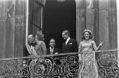 Dutch royal family on the balcony of Paleis Lange Voorhout during Prinsjesdag 1969 showing Prince Bernhard, Queen Juliana, Prince Claus, Mr. Pieter van Vollenhoven, and Princess Margriet