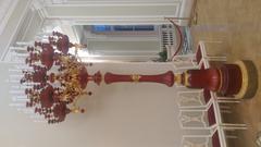 Interior of Anichkov Palace with ornate golden decoration and chandeliers