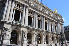 Opera building in Paris, France with detailed façade under blue sky