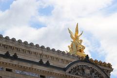 Opera Garnier exterior in Paris France with classical architecture and clear blue sky