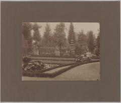 French garden with pond, statues, sundial, and pagoda between Villa and Museum street