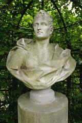 Black and white photograph of the torso of a man in a garden, taken in June 2003