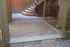 Ground floor interior of Tassel House in Brussels showcasing Art Nouveau architectural design with intricate details and natural lighting