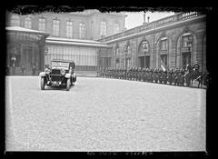 King Christian X of Denmark arriving at the Élysée Palace in Paris in a military ceremony on February 17, 1933