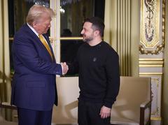 President of Ukraine Volodymyr Zelenskyy participates in a trilateral meeting in Paris with French President Emmanuel Macron and U.S. President-elect Donald Trump on December 7, 2024