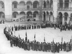 Ceremonial blessing of Akropolis student corporation banner in Krakow courtyard