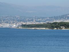 Blockhauss of Bateguier cape and Dragoon cape on Sainte-Marguerite island with Palais des Festivals in Cannes in background