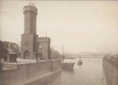 Historical view of Köln harbor entrance with Schiffbrücke and Hohenzollernbrücke bridges in 1912