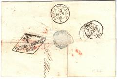Reverse of a Russian stampless folded paid letter to France showing postmarks and transit cancellations