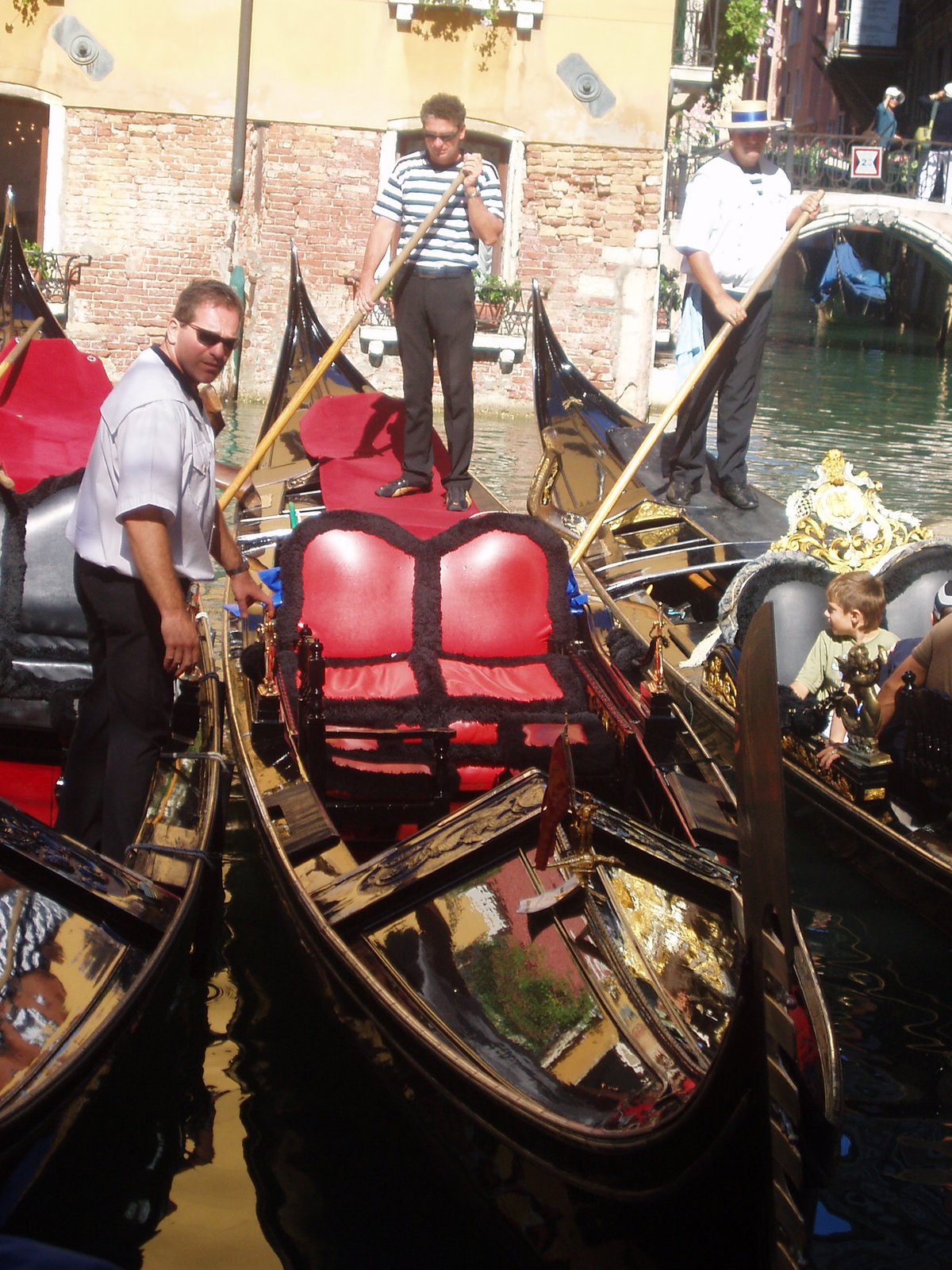 Gondolas in Bacino Orseolo with Ponte del Cavalletto in the background in Venice