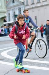 Young skateboarder performing a trick in Ljubljana city