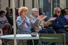 2d Marine Division Band performing at Les Invalides with veterans clapping