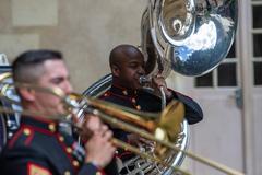 U.S. Marine Corps Cpl. Joshua Fleming playing tuba with 2d Marine Division Brass Band at Les Invalides Paris 2022