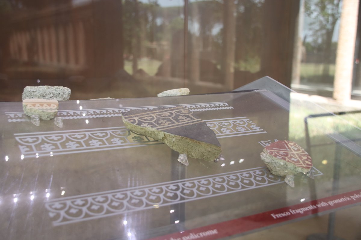 Ancient Roman exhibition in the Palaestra of Pompeii showing classical architecture and sculptures