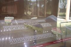 Ancient Roman exhibition in the Palaestra of Pompeii showing classical architecture and sculptures