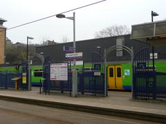 Street view of the Jewellery Quarter in Birmingham with historic buildings and outdoor seating